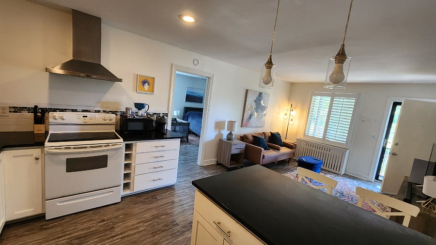 View from equipped kitchen into living space
