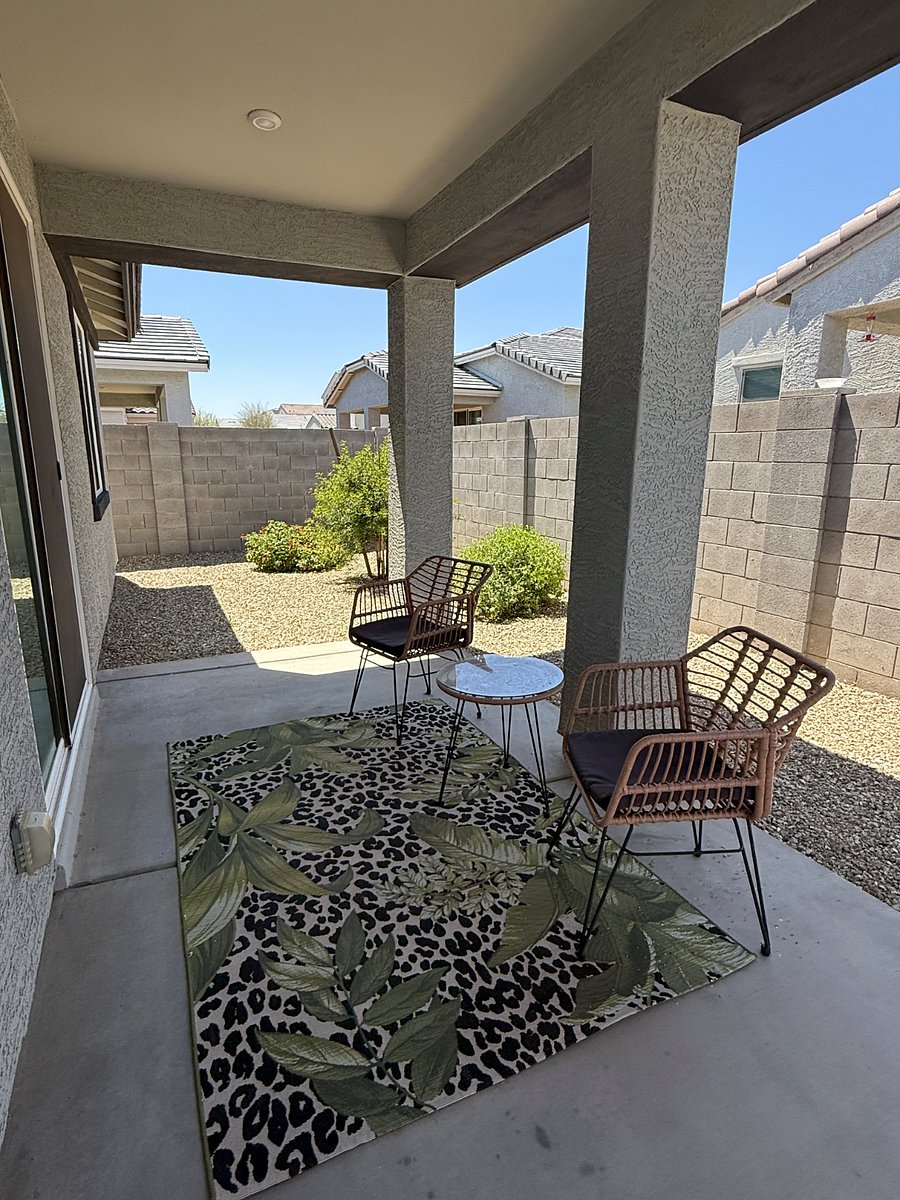 Backyard has covered patio
