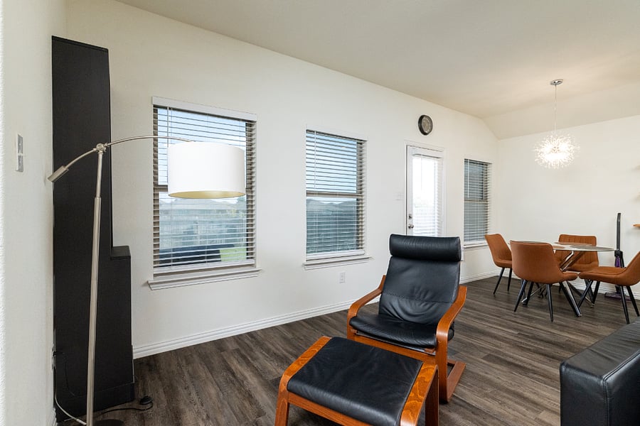 +65 inch TV
+Seating
+Open concept kitchen/living room
+LVP