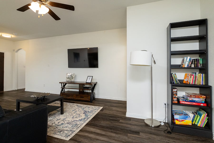 +65 inch TV
+Seating
+Open concept kitchen/living room
+LVP