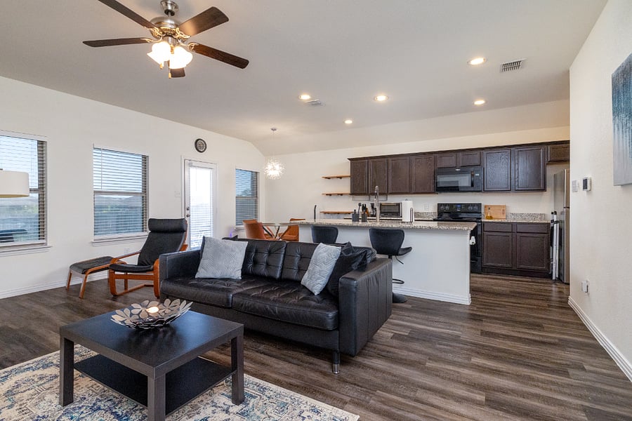 +65 inch TV
+Seating
+Open concept kitchen/living room
+LVP