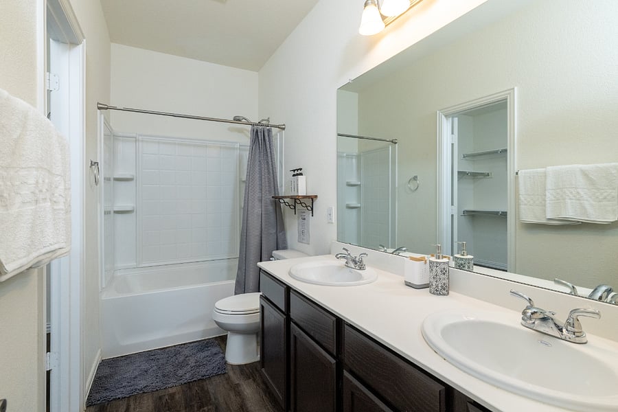 Primary bathroom
+Bath/shower combi
+Dual sinks
+Attached to primary bedroom