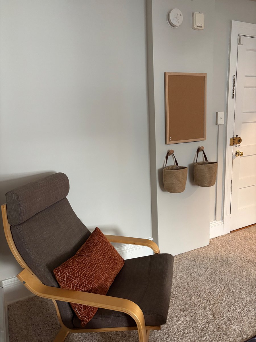 Lounge chair and small table in living/bedroom
