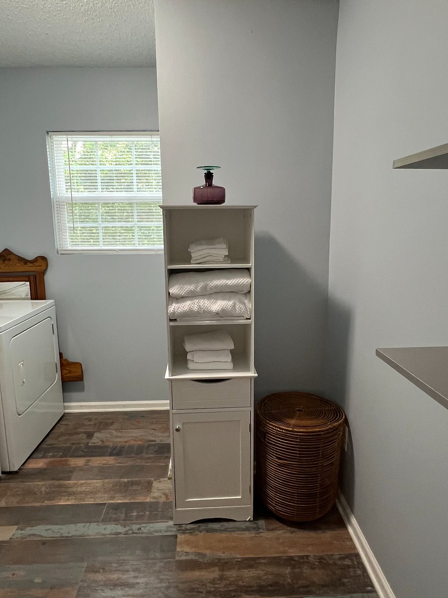 Linen tower with brand new towels and wash cloths.
