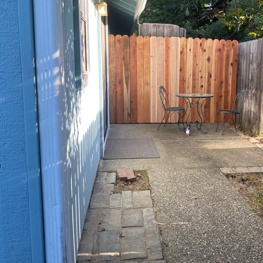 Private outdoor space and patio fenced in seating.