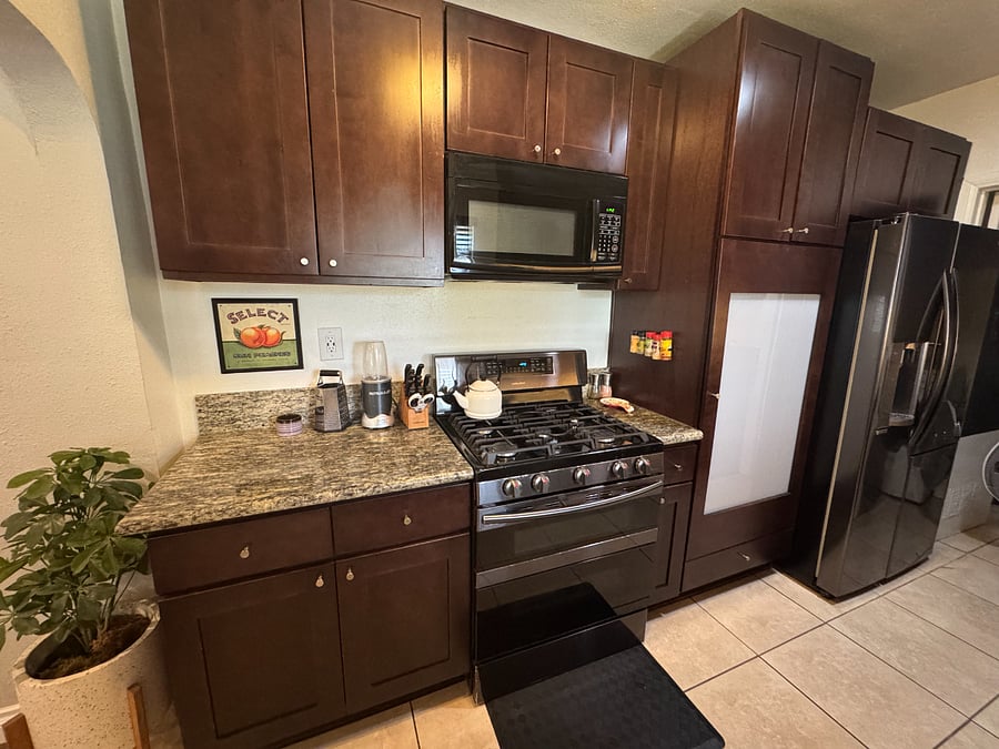 Plenty of space to cook & stock up on food/snacks between pantry & full size refrigerator.
