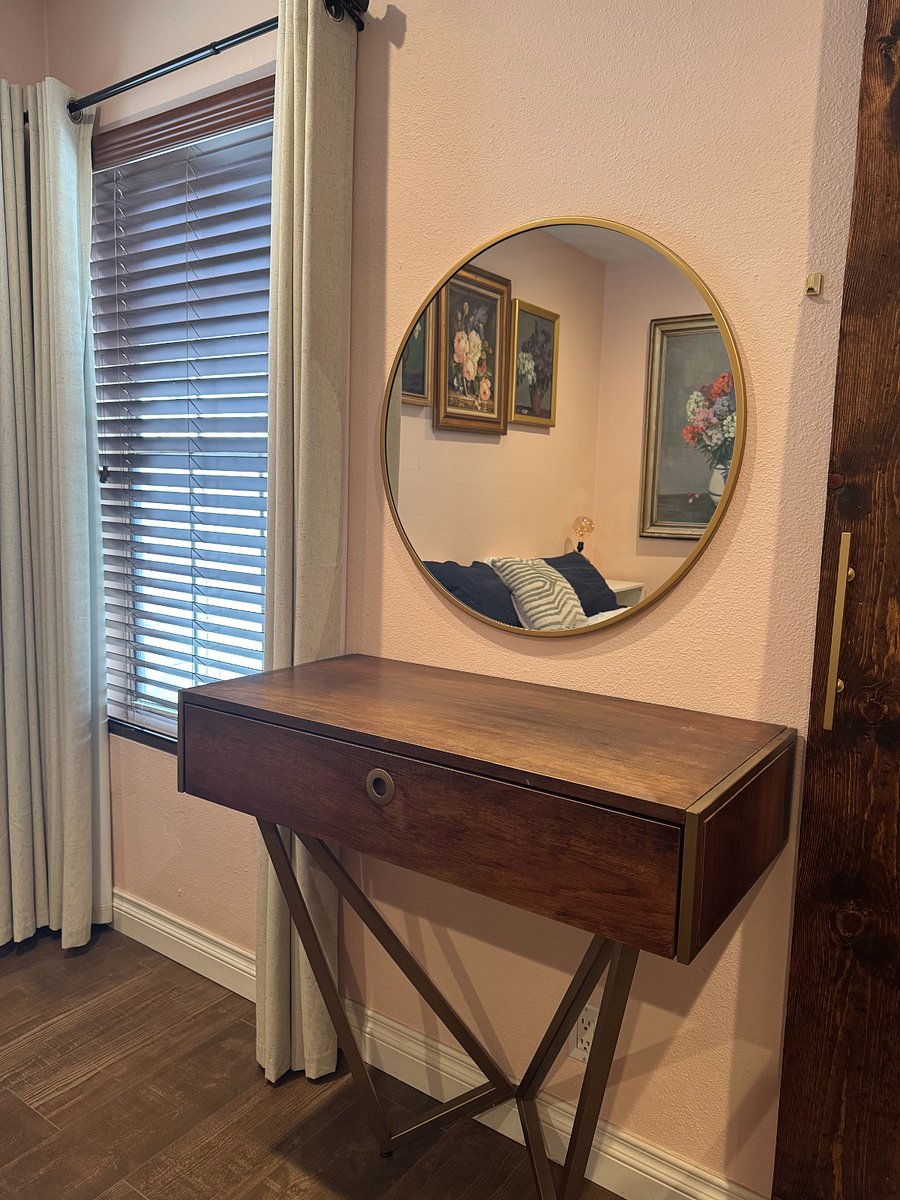 Vanity or laptop workplace in master bedroom with King bed.