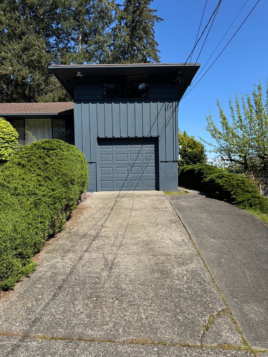 Available driveway you may use or park on the street. You bedroom is above the garage.