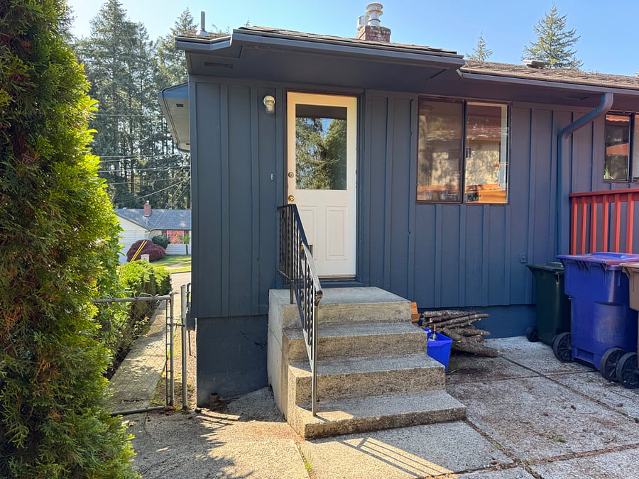 Sidewalk that connects driveway to back door, separate semi-private entrance if/when desired.
