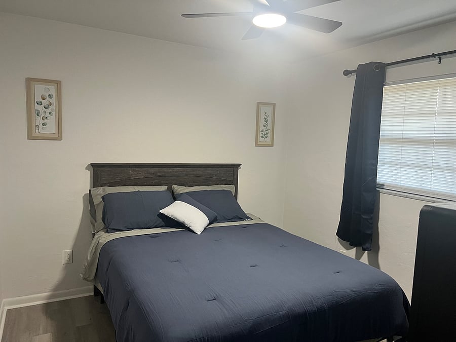 Queen size bed with blackout curtains