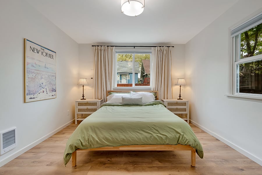 Bedroom features black-out shades and comfortable queen bed. Extra blankets are available.