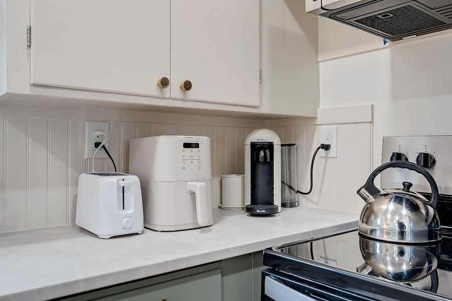 A variety of small appliances are available for your use, including a Nespresso coffee machine, Brita water filter pitcher, air fryer, toaster, etc.
