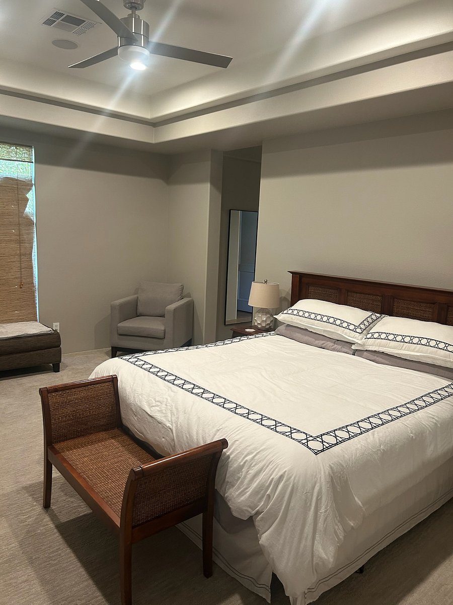Primary bedroom with Cal King Bed, ceiling fan, smart TV with cable, and Sonos speaker.