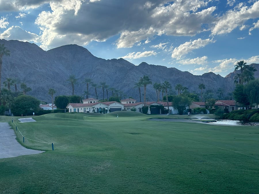 Golf course view behind house