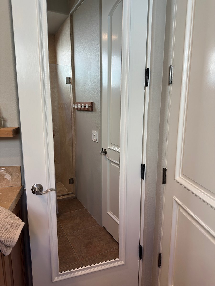 Bathroom #3 has a full-length mirror on the closet door.