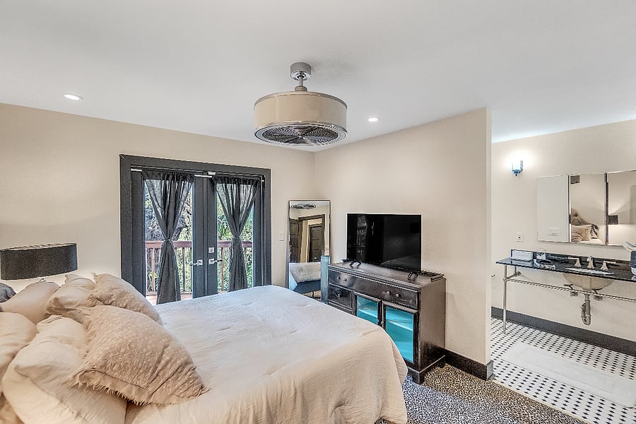 Master bedroom & bathroom. French doors to outside upper deck.