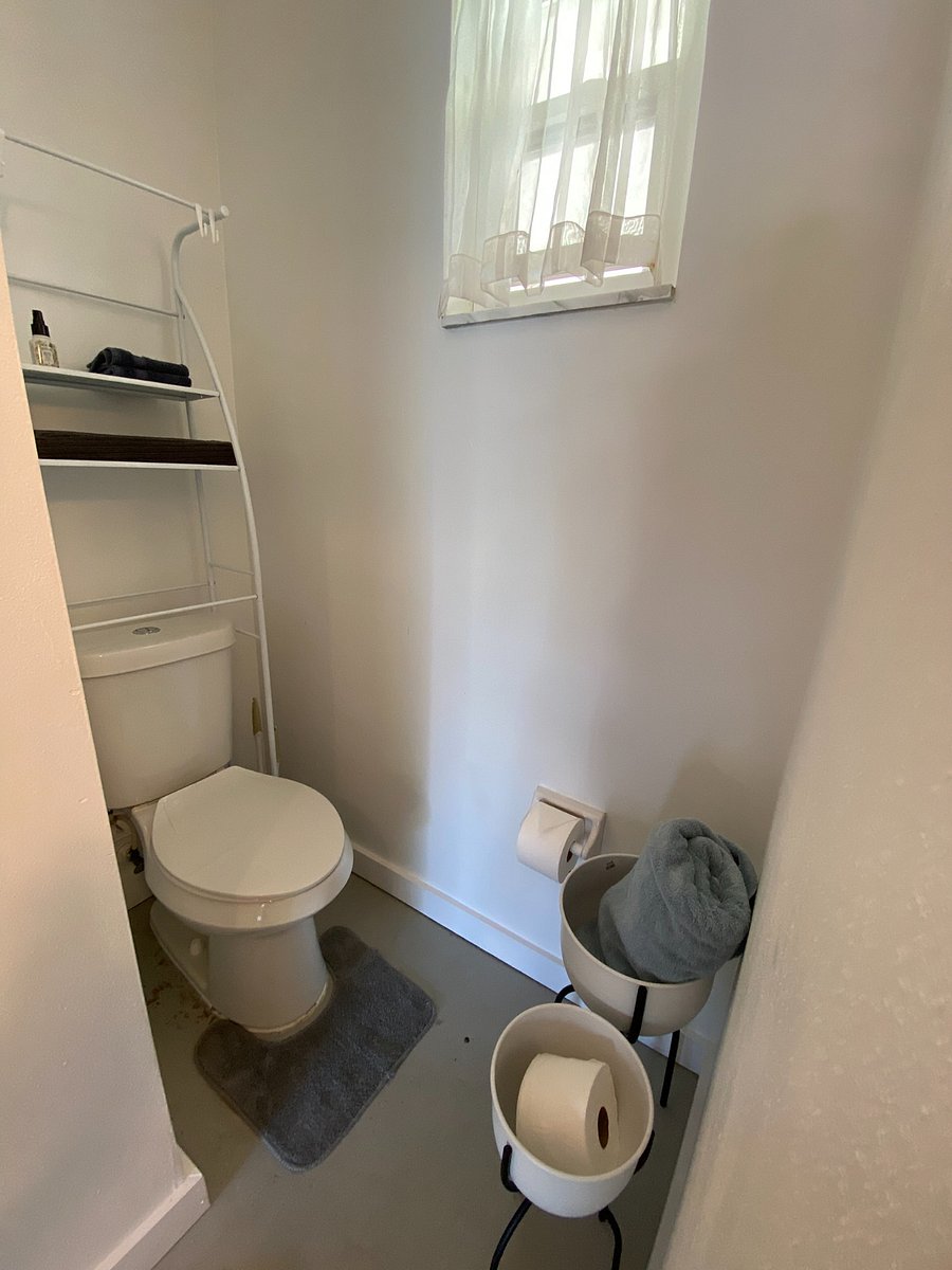 Pool bathroom located in rear of garage