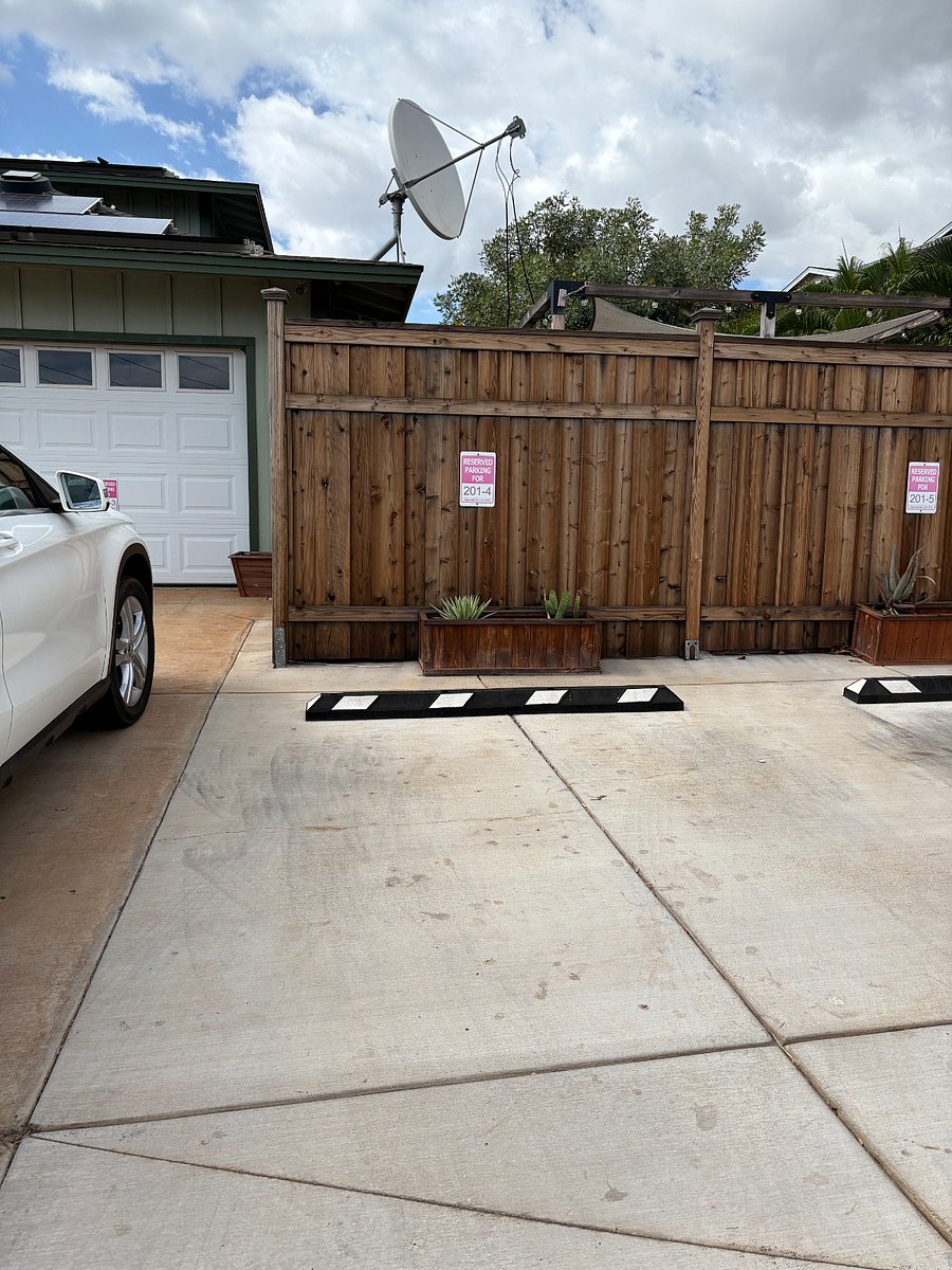 Parking outside fence of unit