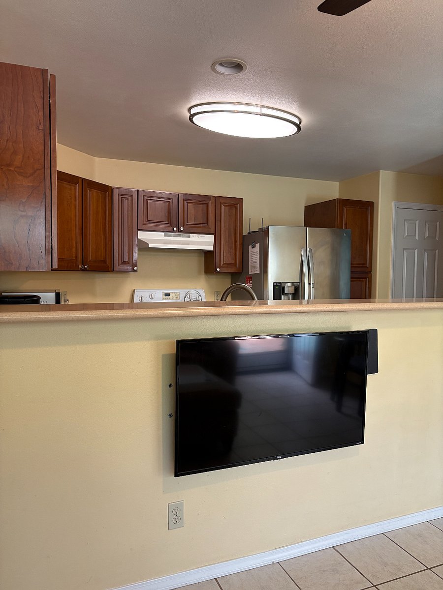 living room kitchen island with TV