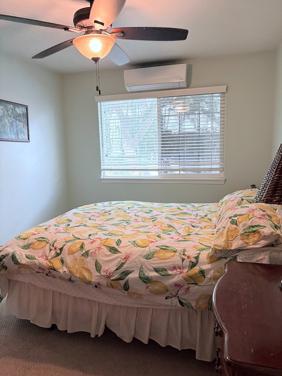 Queen size bed , 2 nights stands and Armoire. Glass door closet.