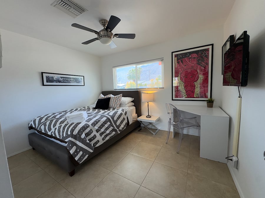 4th Bedroom features a dedicated workspace, large closet, and flatscreen TV. Also, beautiful mountain views!