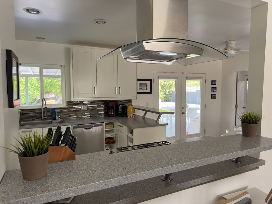 Loaded Kitchen with: new fridge, dishwasher, garbage disposal, convection oven, microwave, gas stove top, tons of storage and stocked with everything to cook, bake, broil, grill and serve!