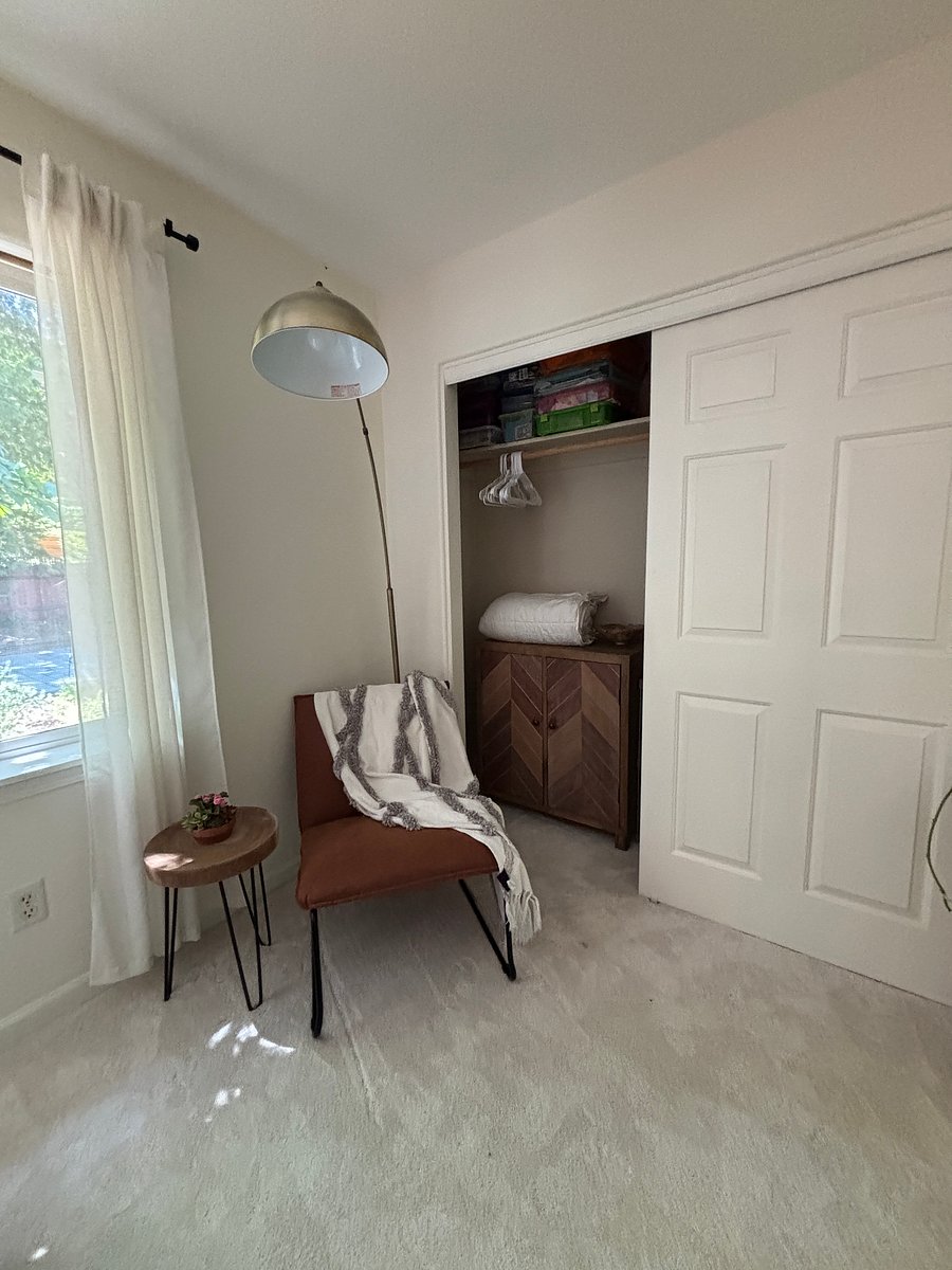 Cozy sitting area by the bid window facing the backyard