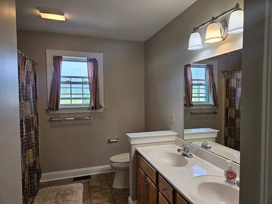 Rental shared full bath, with dual sinks