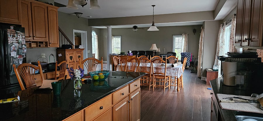 Kitchen, prep and seating view (family room also seen)