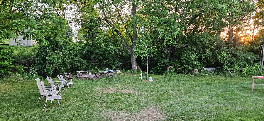 Relax around the campfire, down by the trickling stream.