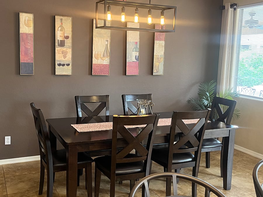 Dining area with view of beautiful patio & pool