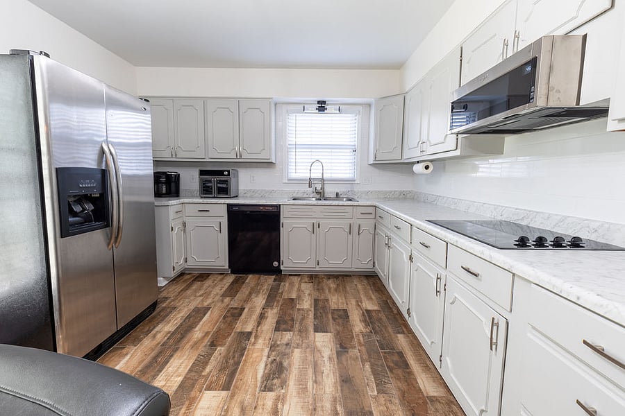 Kitchen renovated as of 2024 / Fire extinguishers located in kitchen / Microwave, Toaster, Airfryer, Dishwasher, Blender