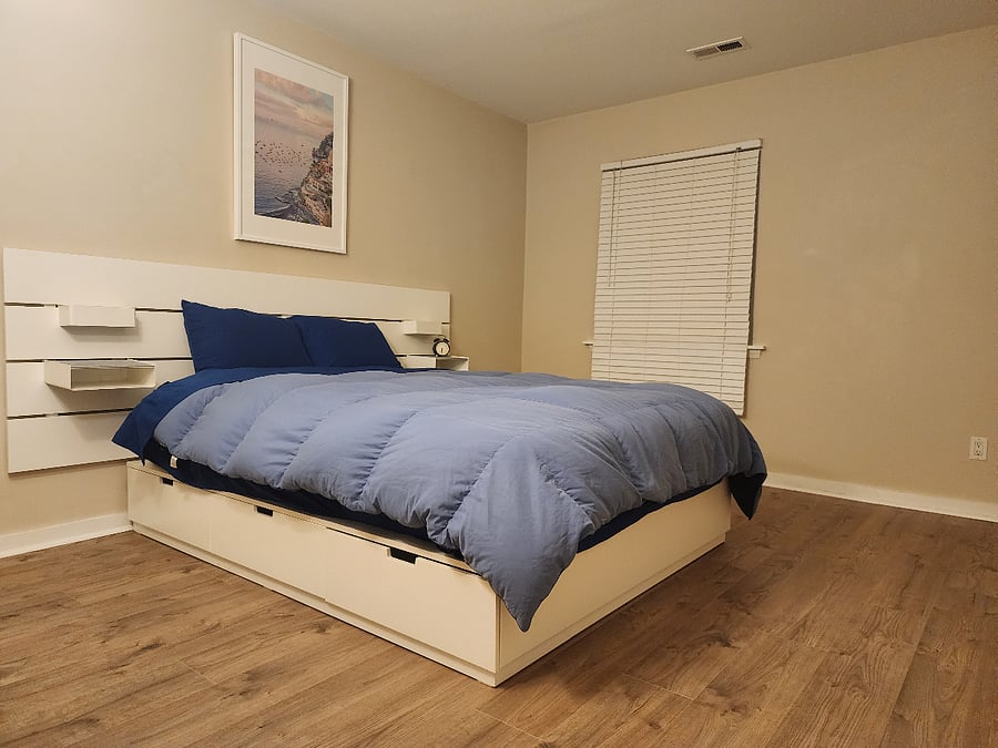 Guest bedroom with full closet and under bed storage
