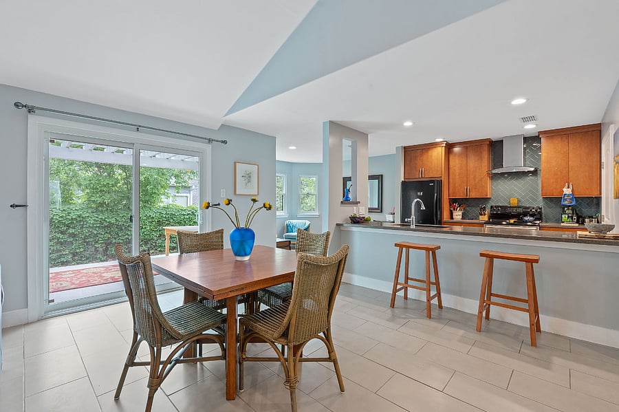 Dining area. This table flutes out into a large, round table that can seat 8 comfortably. Extra chairs are in the garage.