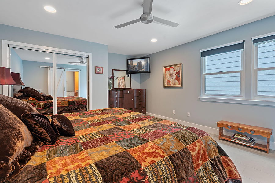 Two windows with blackout shades.