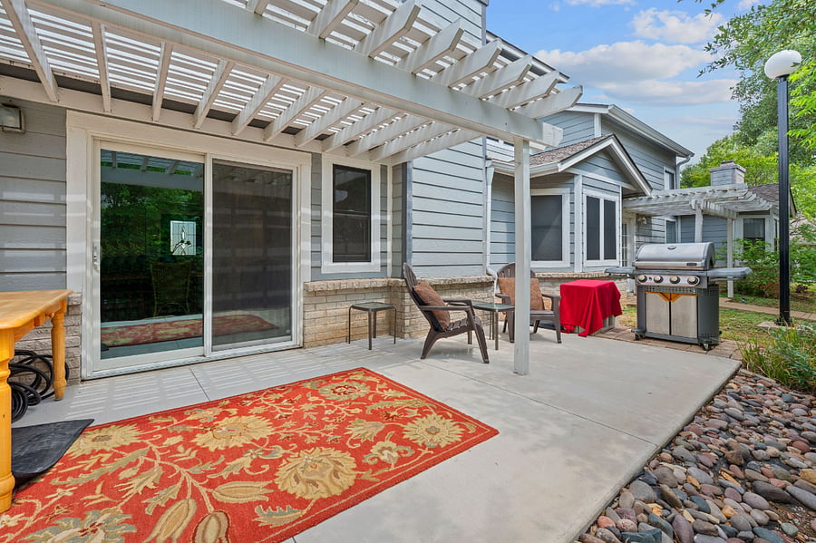 Back patio w extended gas grill. 