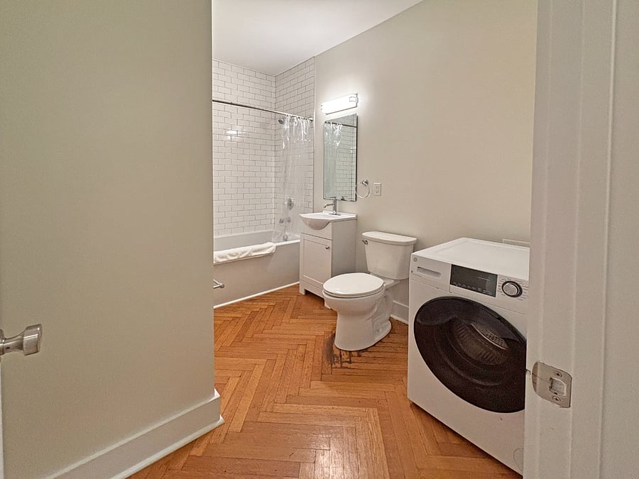 Updated bathroom with in-unit laundry