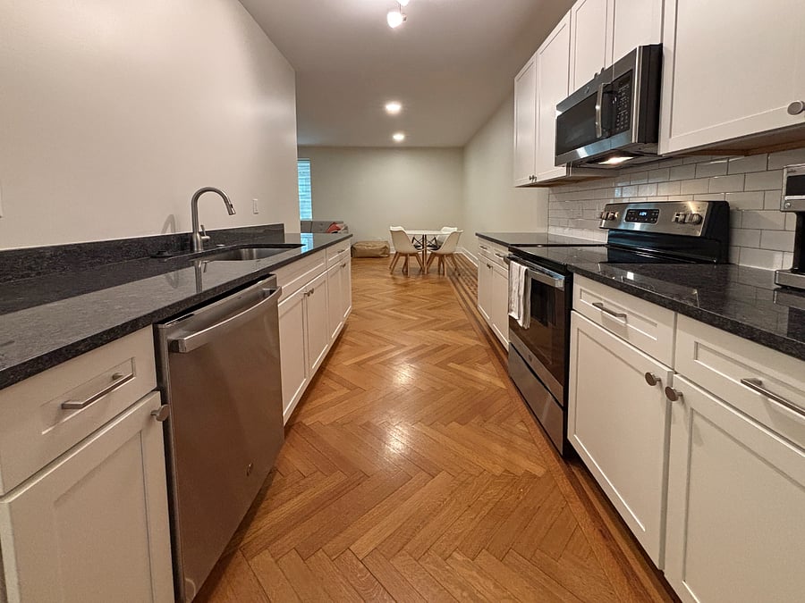 Fully stocked kitchen with high end appliances and granite counter tops