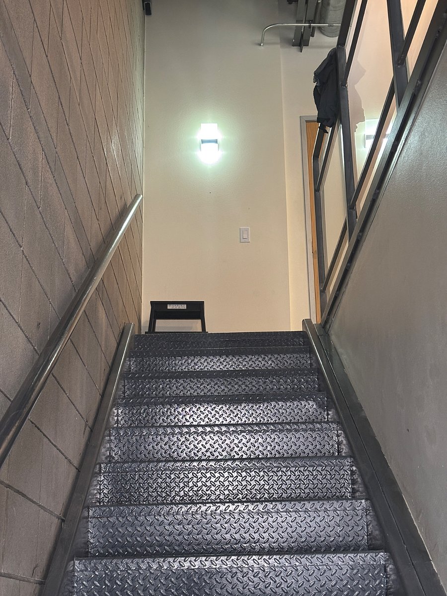 Stairwell from Front Entrance/Garage to 2nd floor Living Room & Kitchen