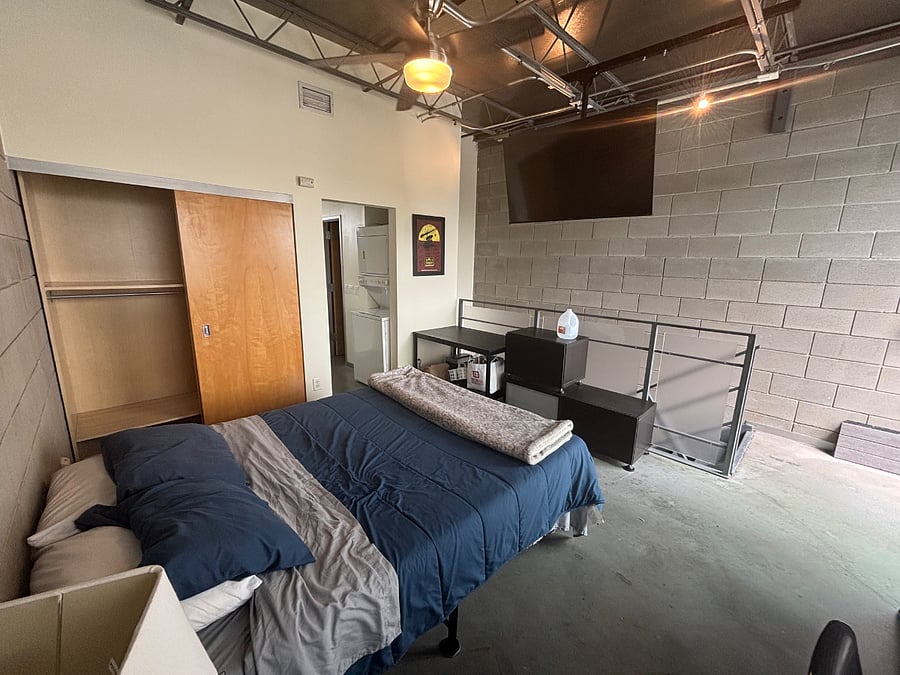 Alternate view of 3rd floor loft master bedroom.   1st Storage closet. 