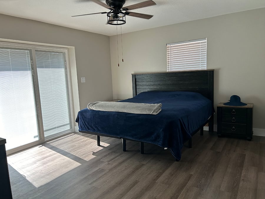 Master bedroom with king sized bed.