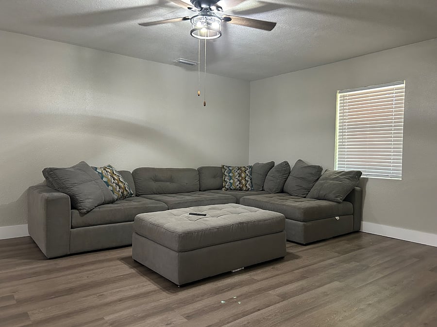 Living room with oversized couch.