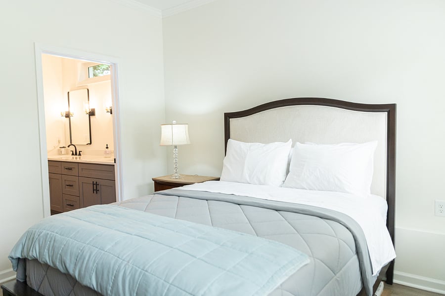 Comfortable, clean queen size bed with outlets on both sides.