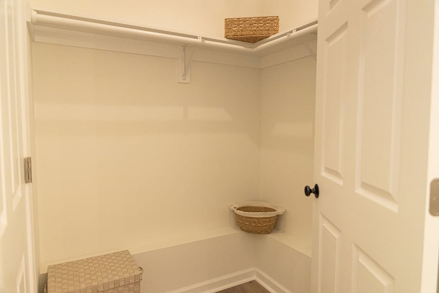 Big walk-in closet before you walk into a smaller closet. There's so much space here.