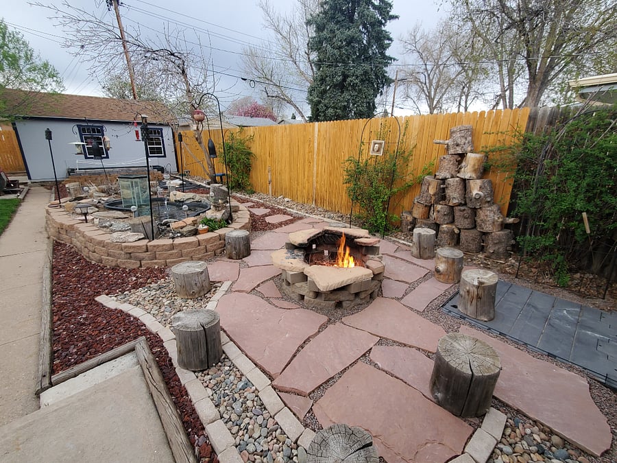 Backyard firepit and koi pond