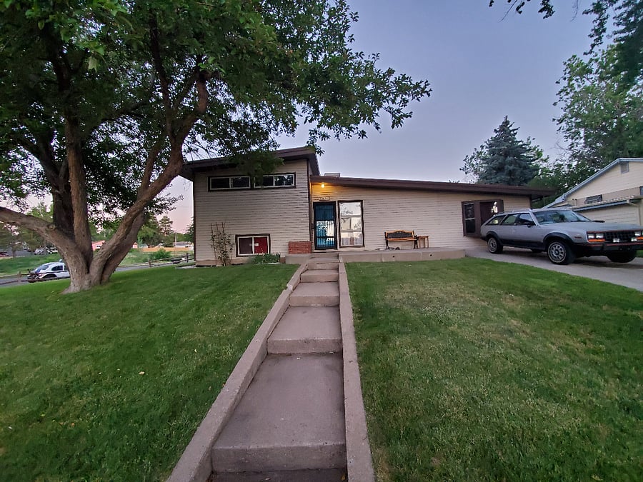 Front of house, private driveway on right is for tenant vehicle.