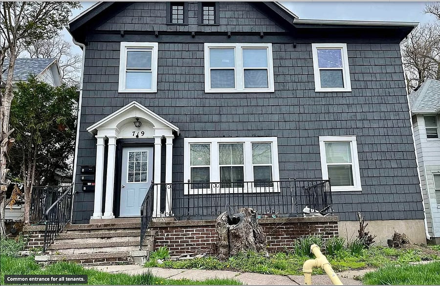 Street view of the building. The front door is a the common entrance for all units. 