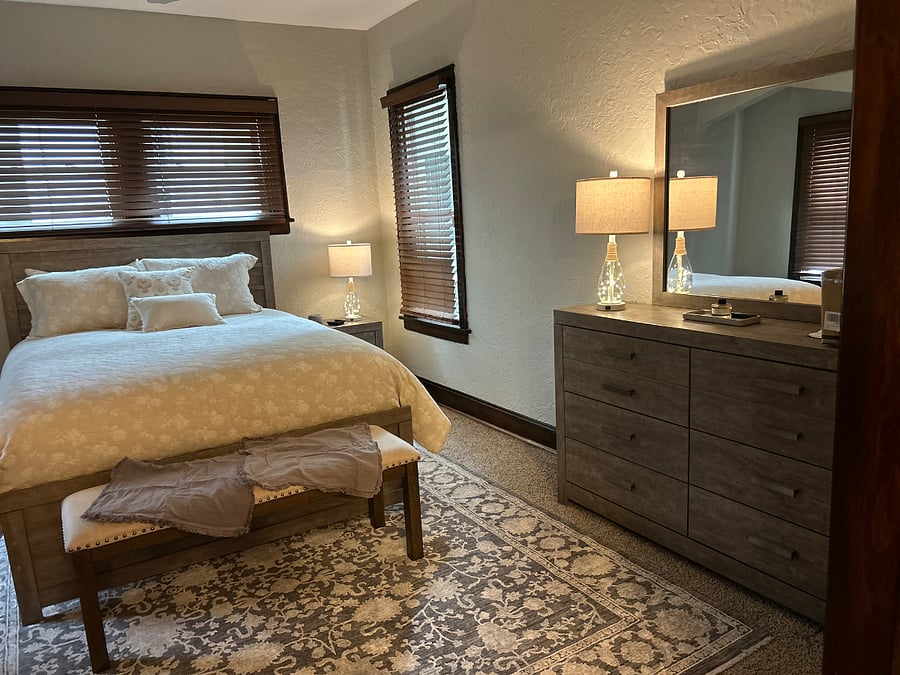 The bench on the end of the bed gives you a place to sit as you put your shoes on before you start your day! 
