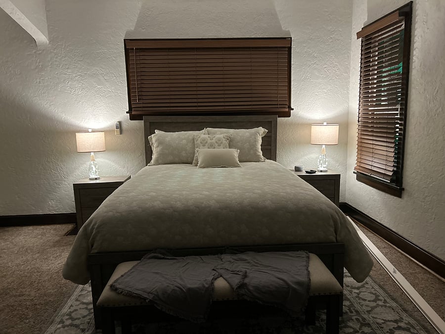 View from the French doors to your freshly painted bedroom. Bedset is brand new and is queen sized with plenty of storage. To the left of the bed just inside the French doors is another large walk in closet with built in drawers. 