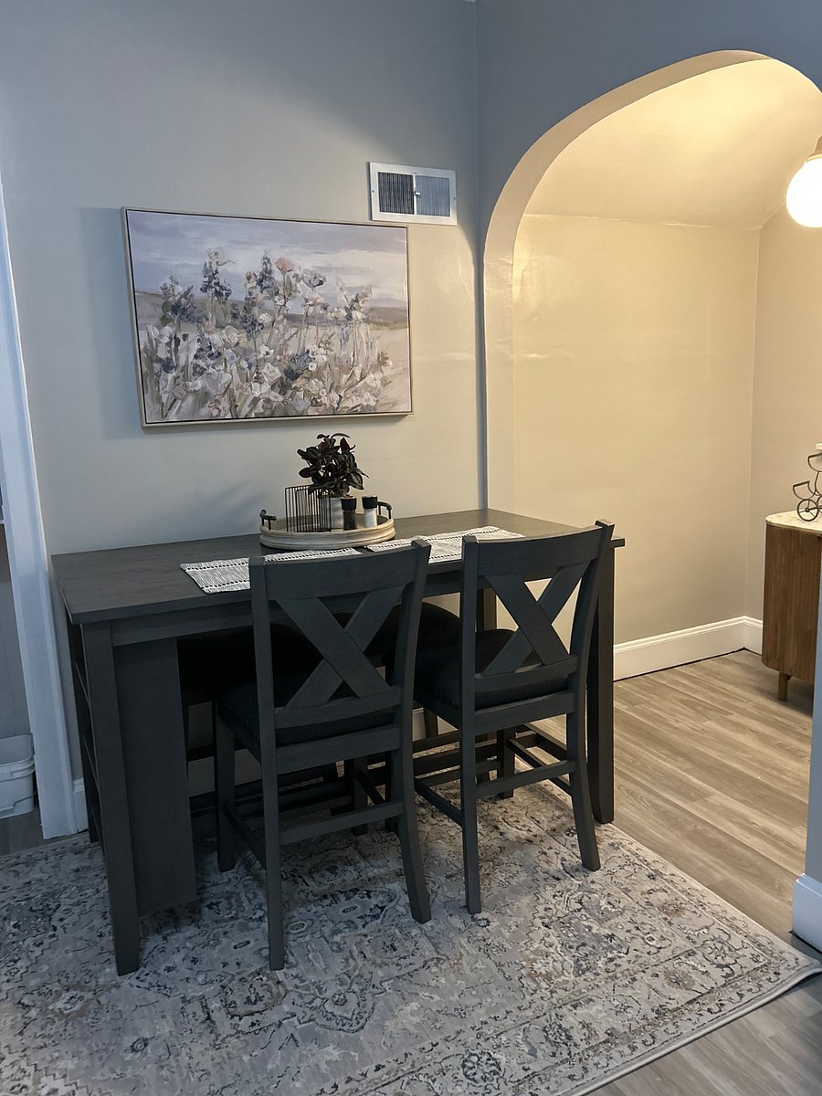 Kitchen Preview: New kitchen table with plenty of seating for 4. The bar stool seats are tucked underneath against the wall. The table can be pulled out further into the center of the kitchen for dinner guests! 